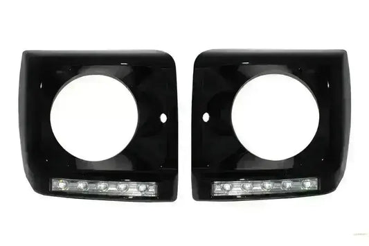 Abdeckungen für Mercedes G W463 89-12 LED DRL Chrom G65 Look Schwarz CarPartsTuning