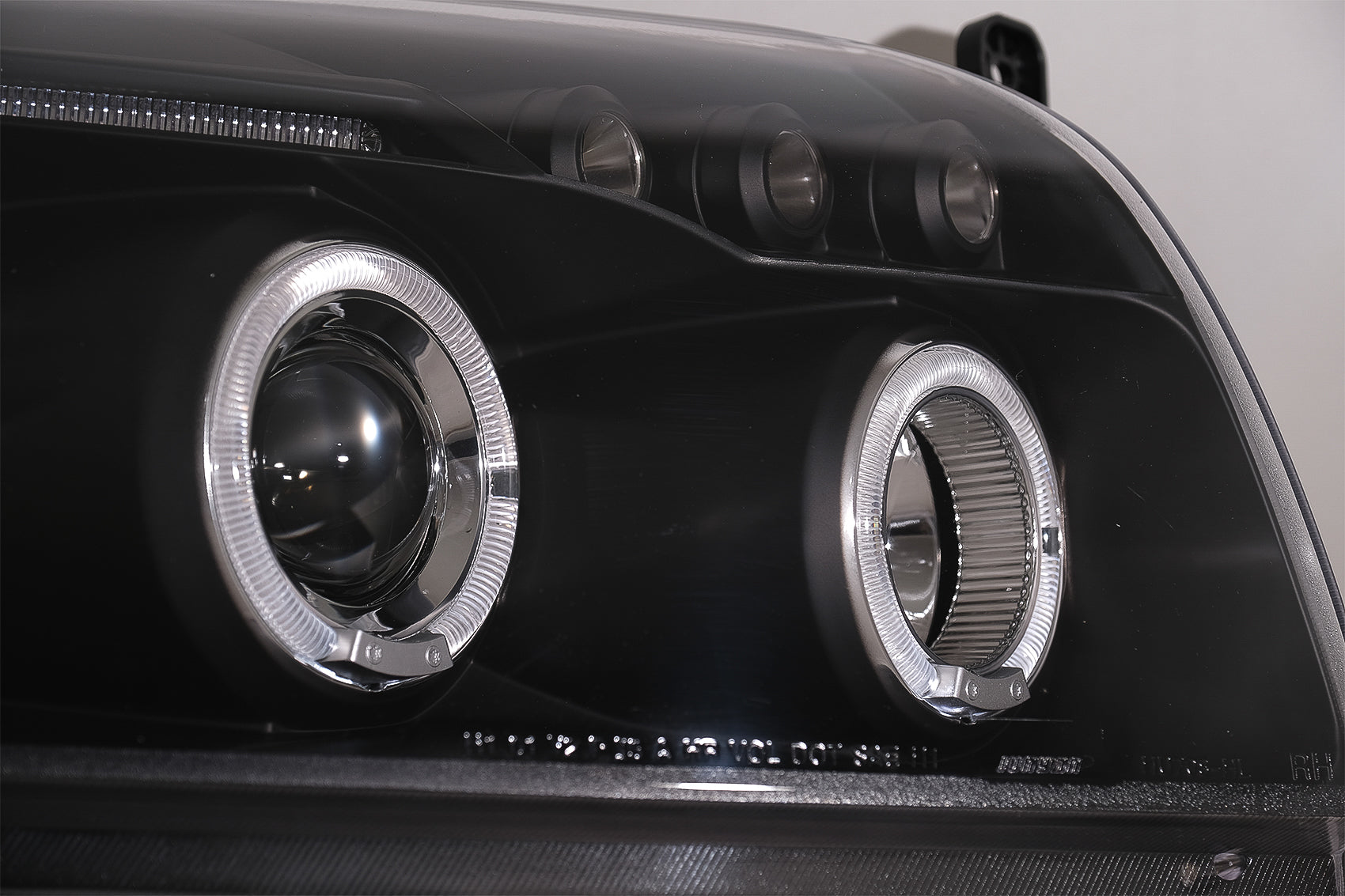 Angel Eyes Scheinwerfer passend für Dodge Caliber (2006-2012) Schwarz CarPartsTuning